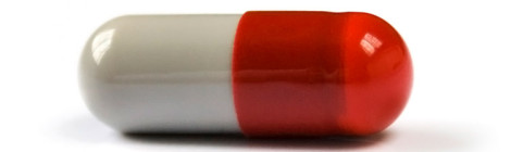 Close-up image of a single pharmaceutical caplet.